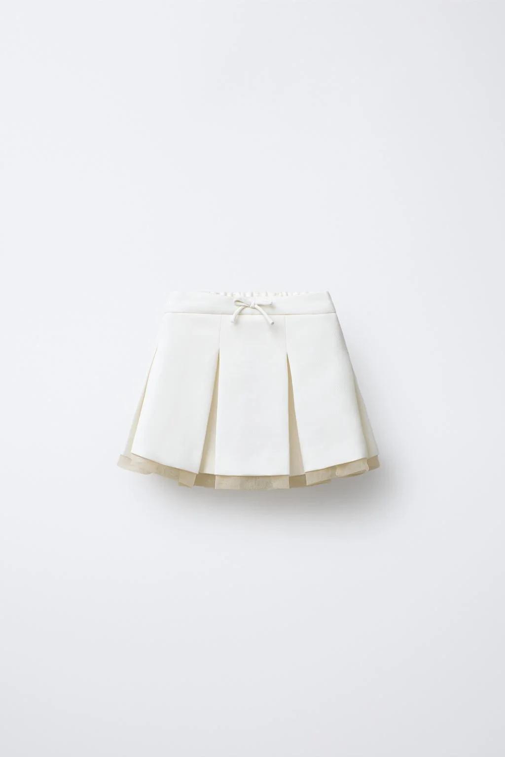 BOX PLEAT SKIRT WITH TULLE HEM