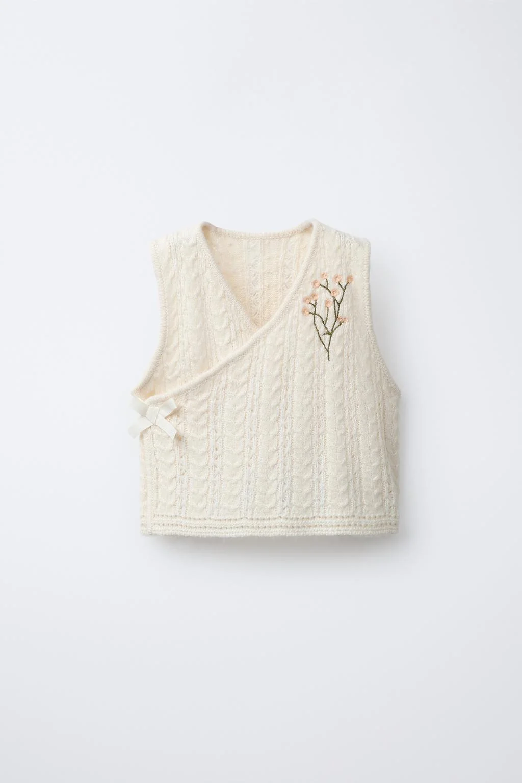KNIT VEST WITH EMBROIDERED FLOWERS