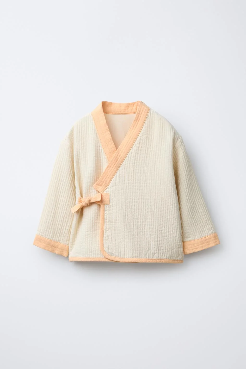 TEXTURED SHIRT WITH TIED DETAIL