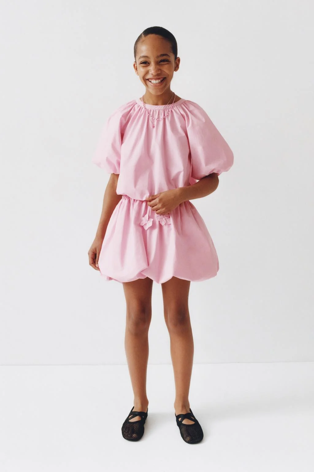 PUFF SLEEVE TOP WITH GEM BUTTON