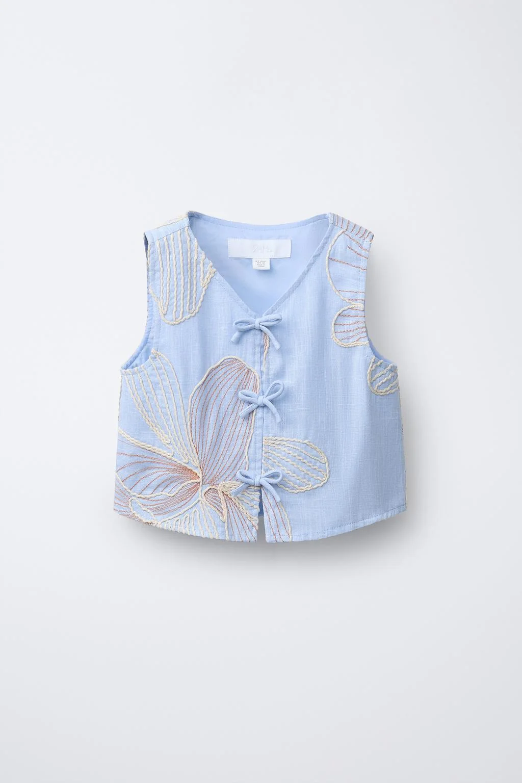 EMBROIDERED TOP WITH BOWS