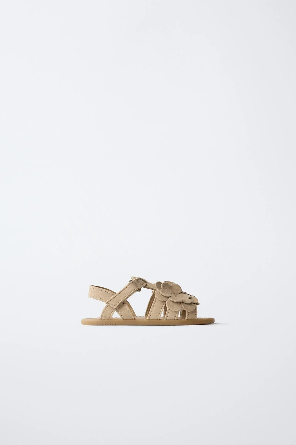 LEATHER SANDALS WITH FLORAL DETAIL