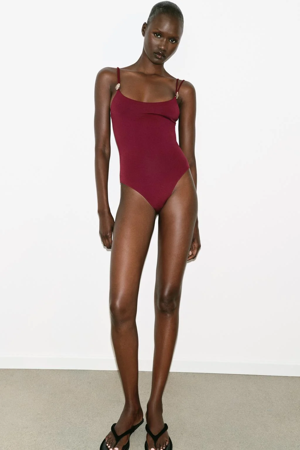 Боди из полиамида с металлическим декором