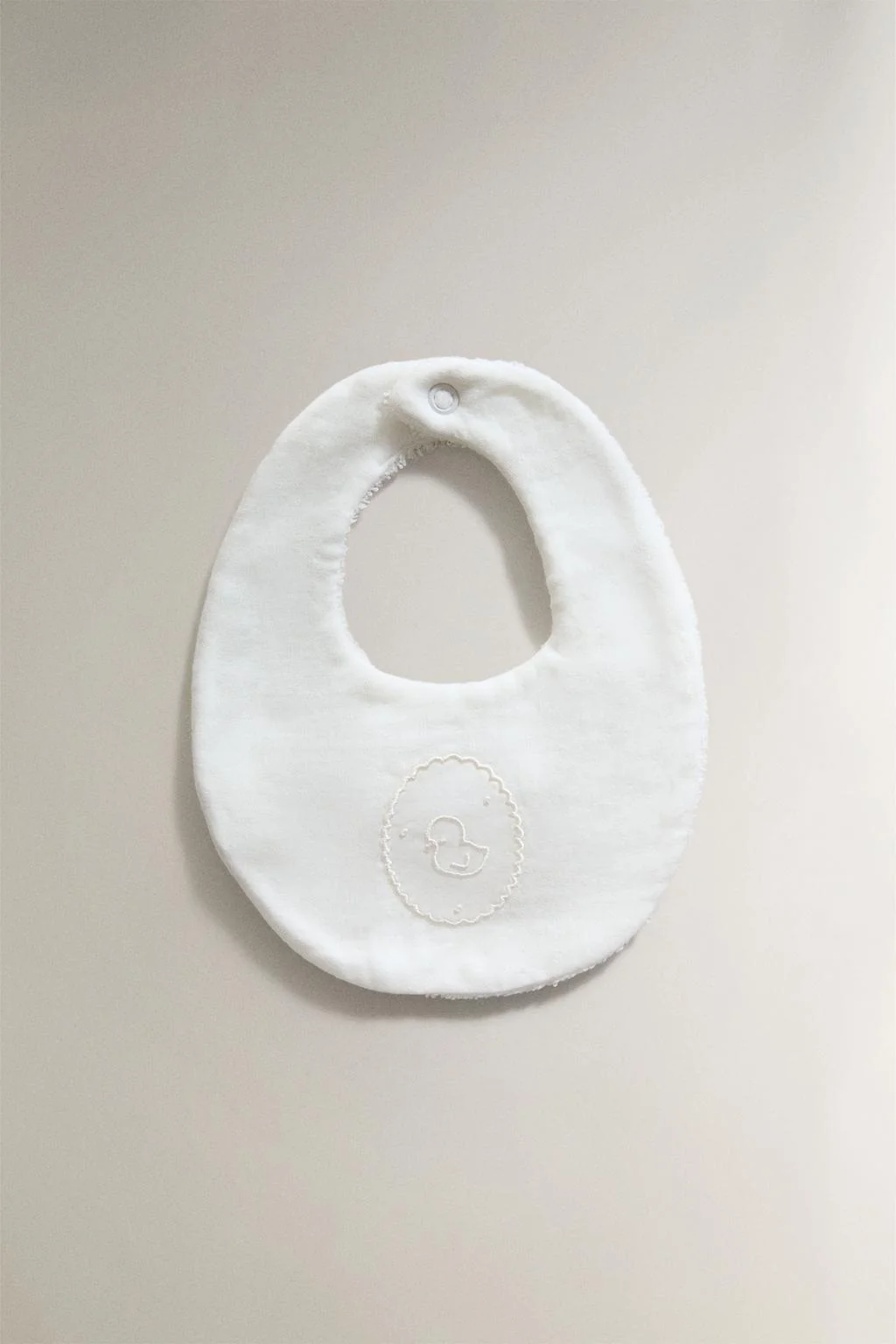 BABY BIB WITH EMBROIDERED CHICK
