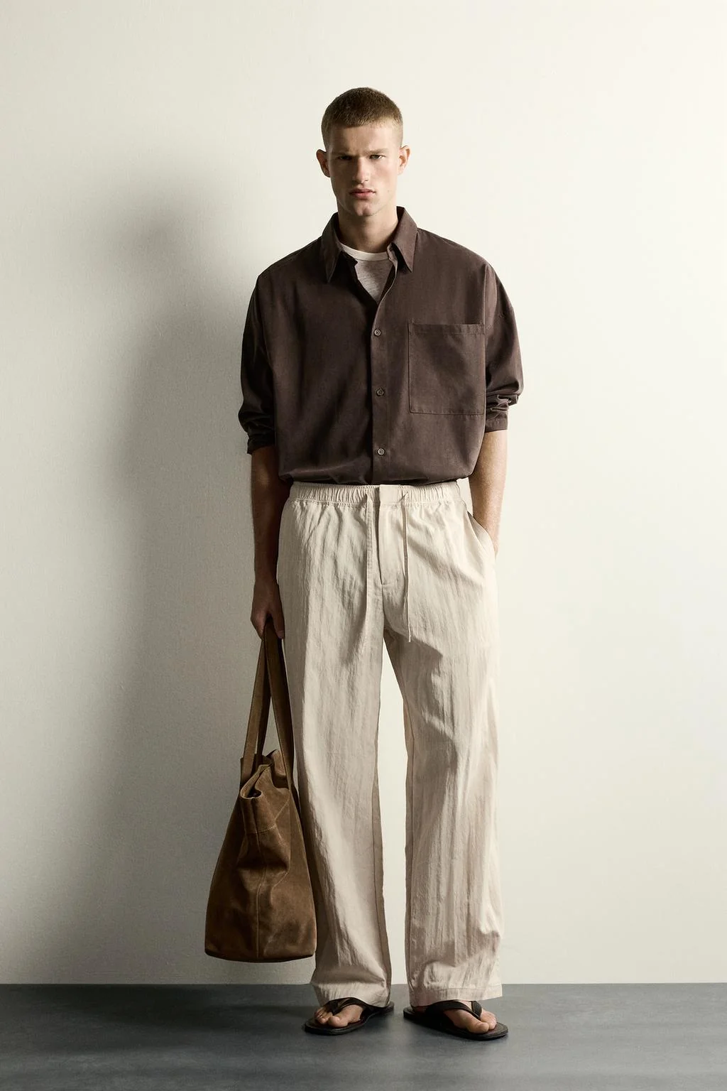 CRINKLED TECHNICAL RELAXED FIT TROUSERS