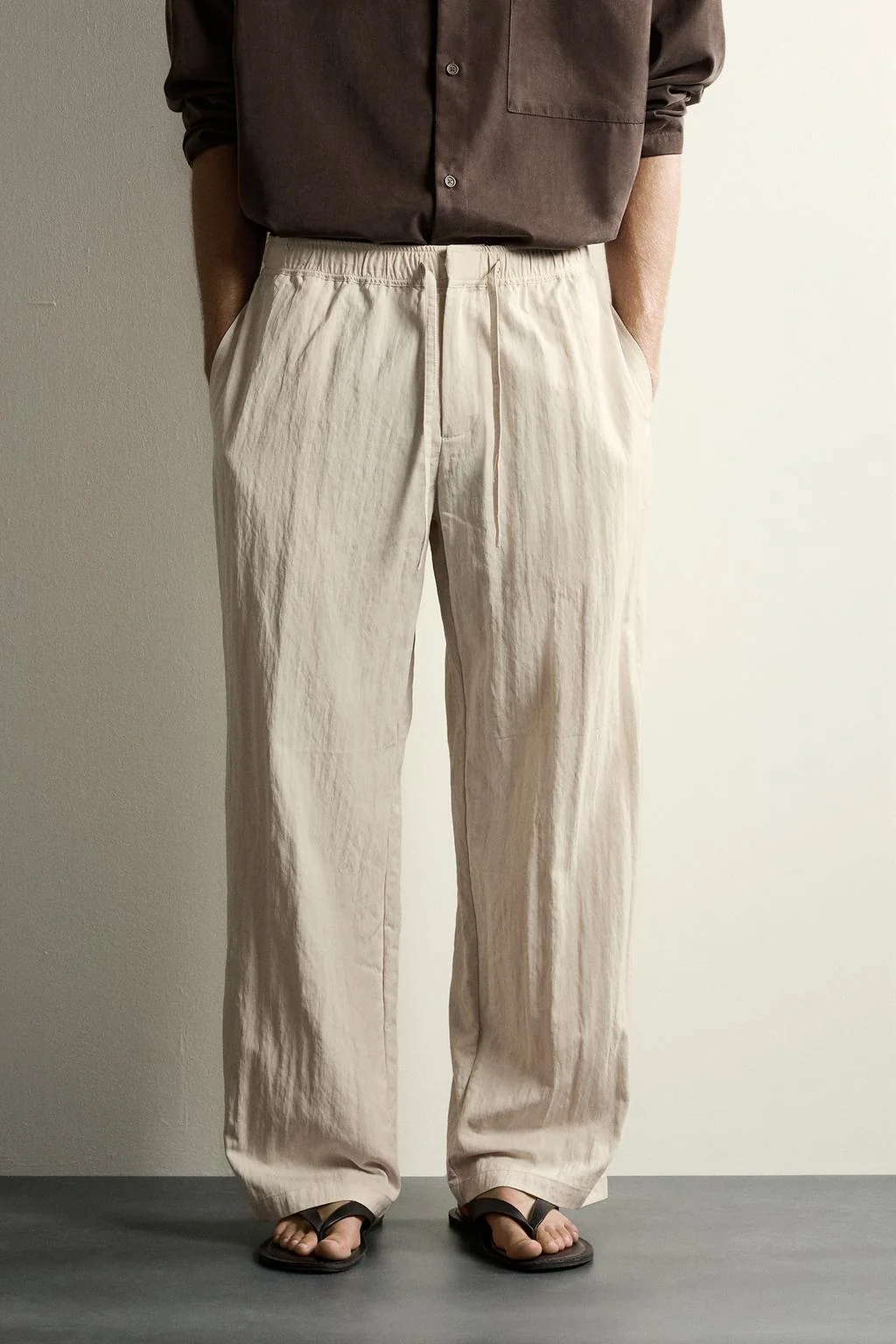 CRINKLED TECHNICAL RELAXED FIT TROUSERS
