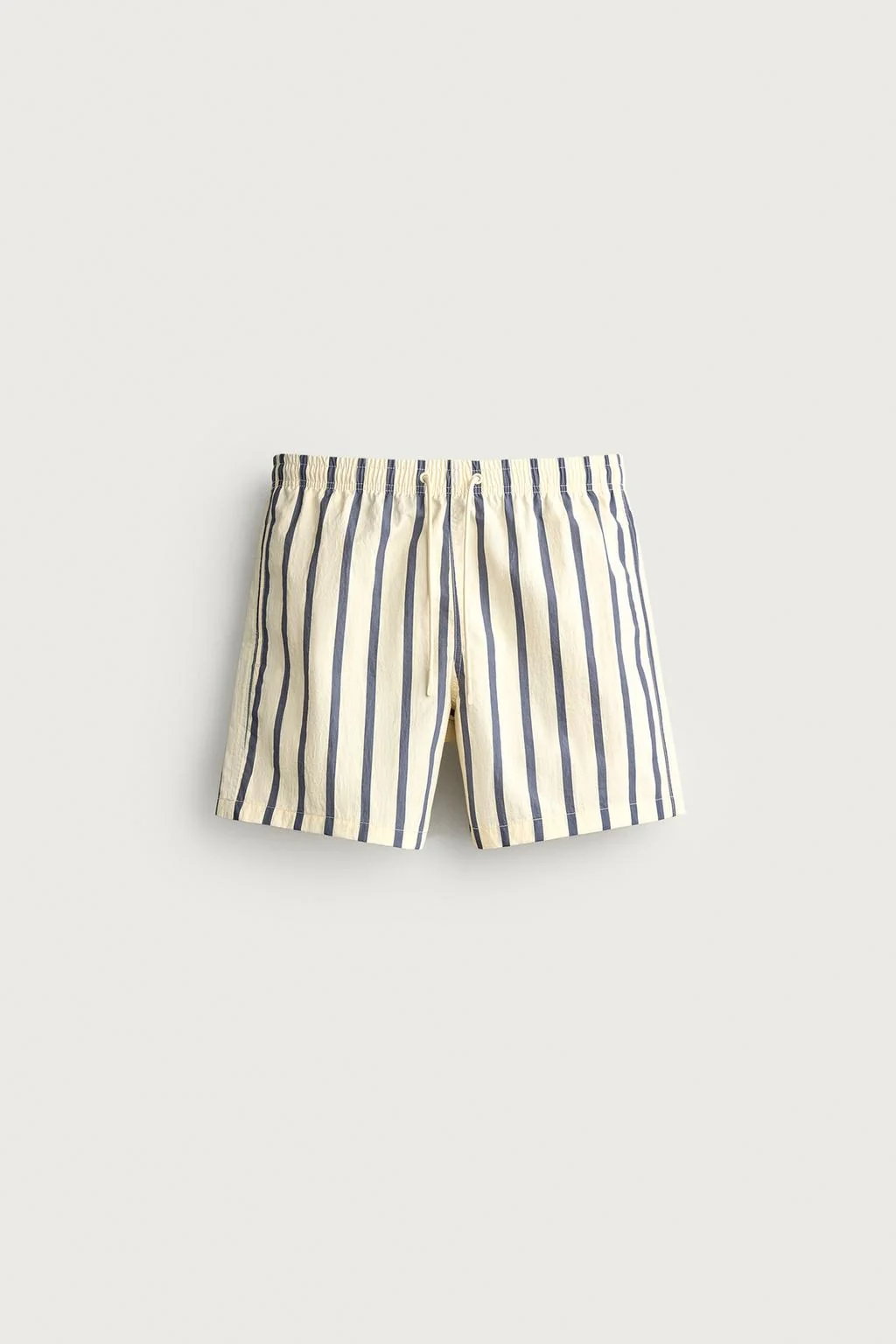 STRIPED MID-LENGTH SWIMMING TRUNKS