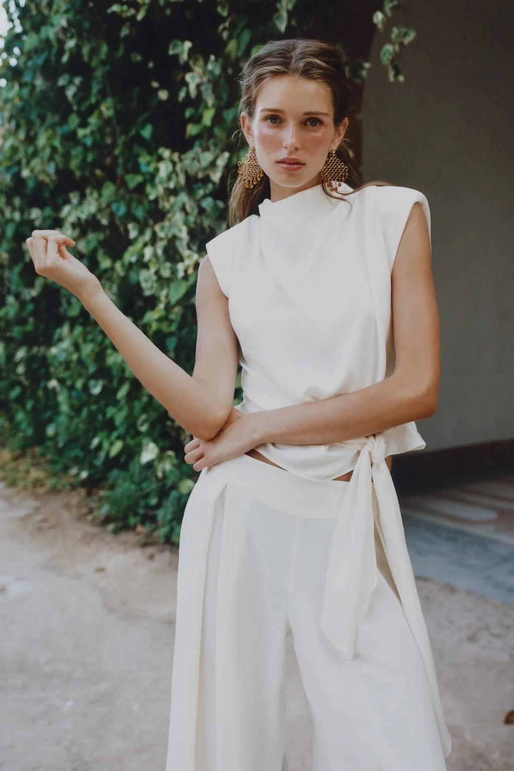 SATIN TOP WITH SHOULDER PADS AND KNOT