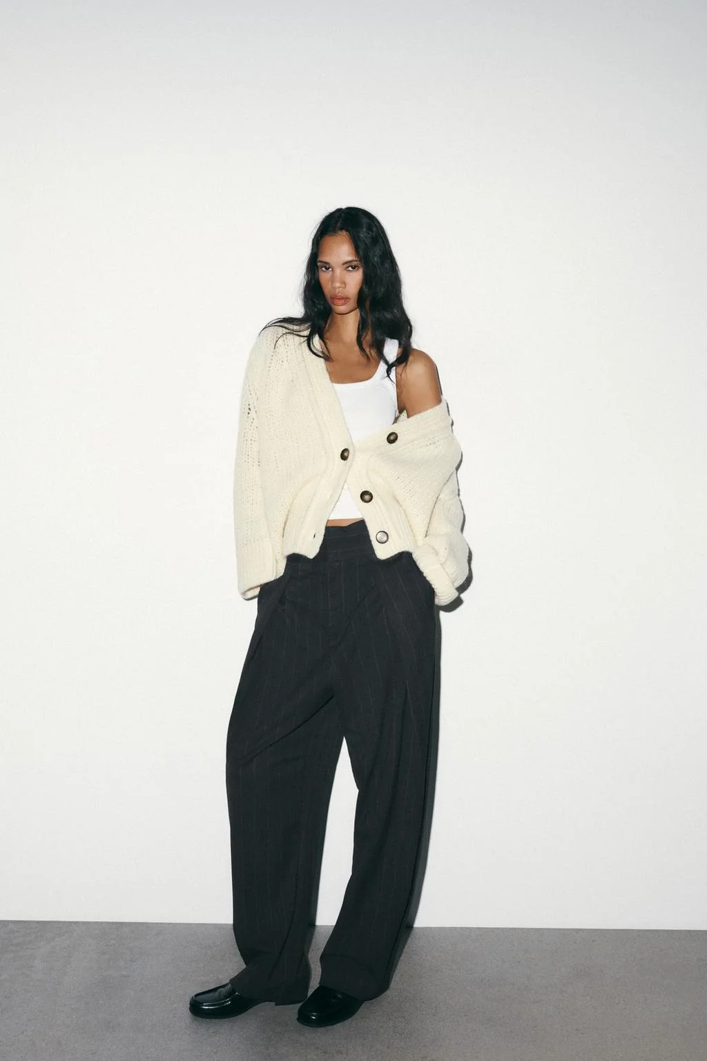 Брюки-баллон в полоску со складками