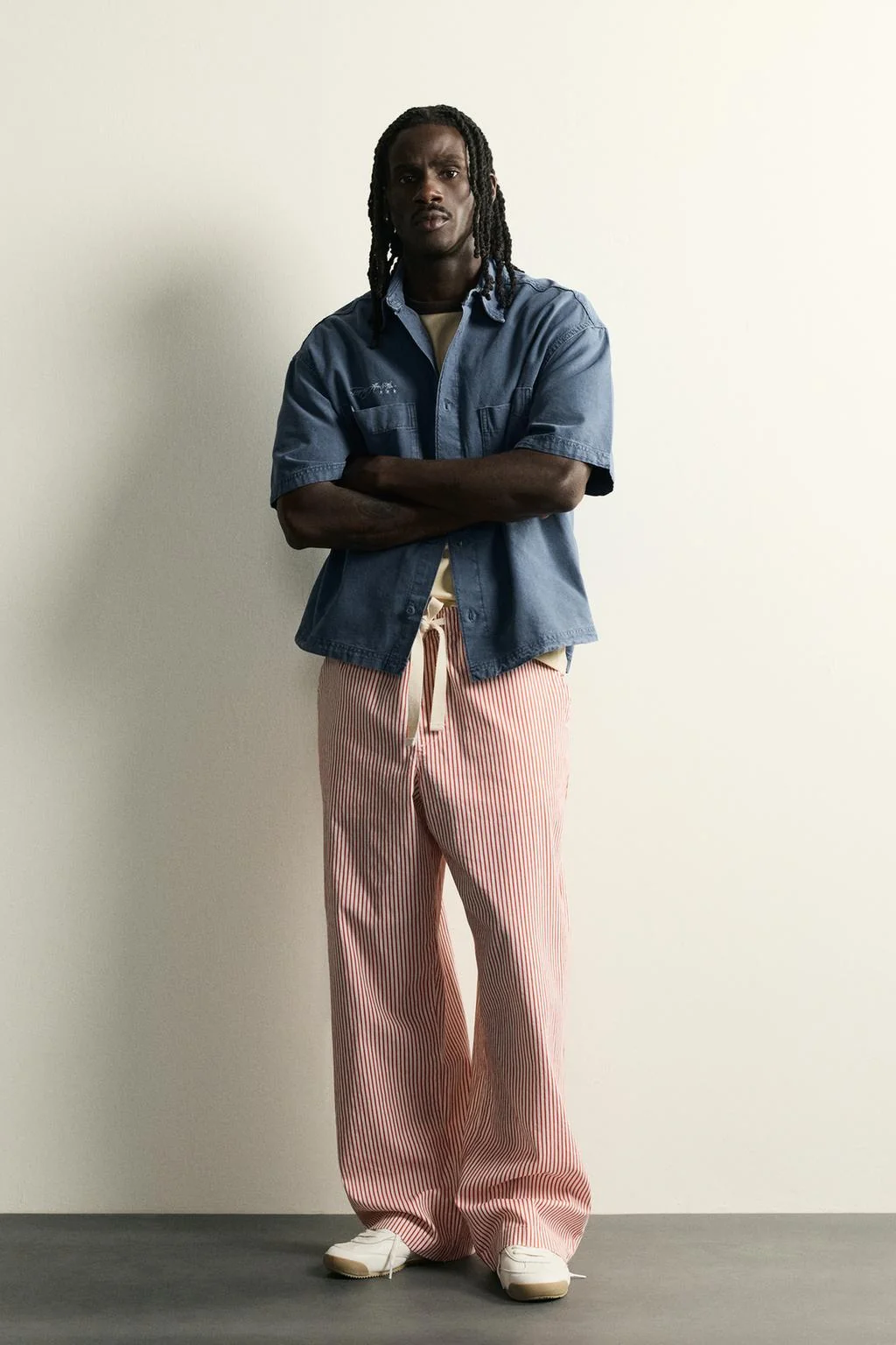 STRIPED BAGGY FIT TROUSERS