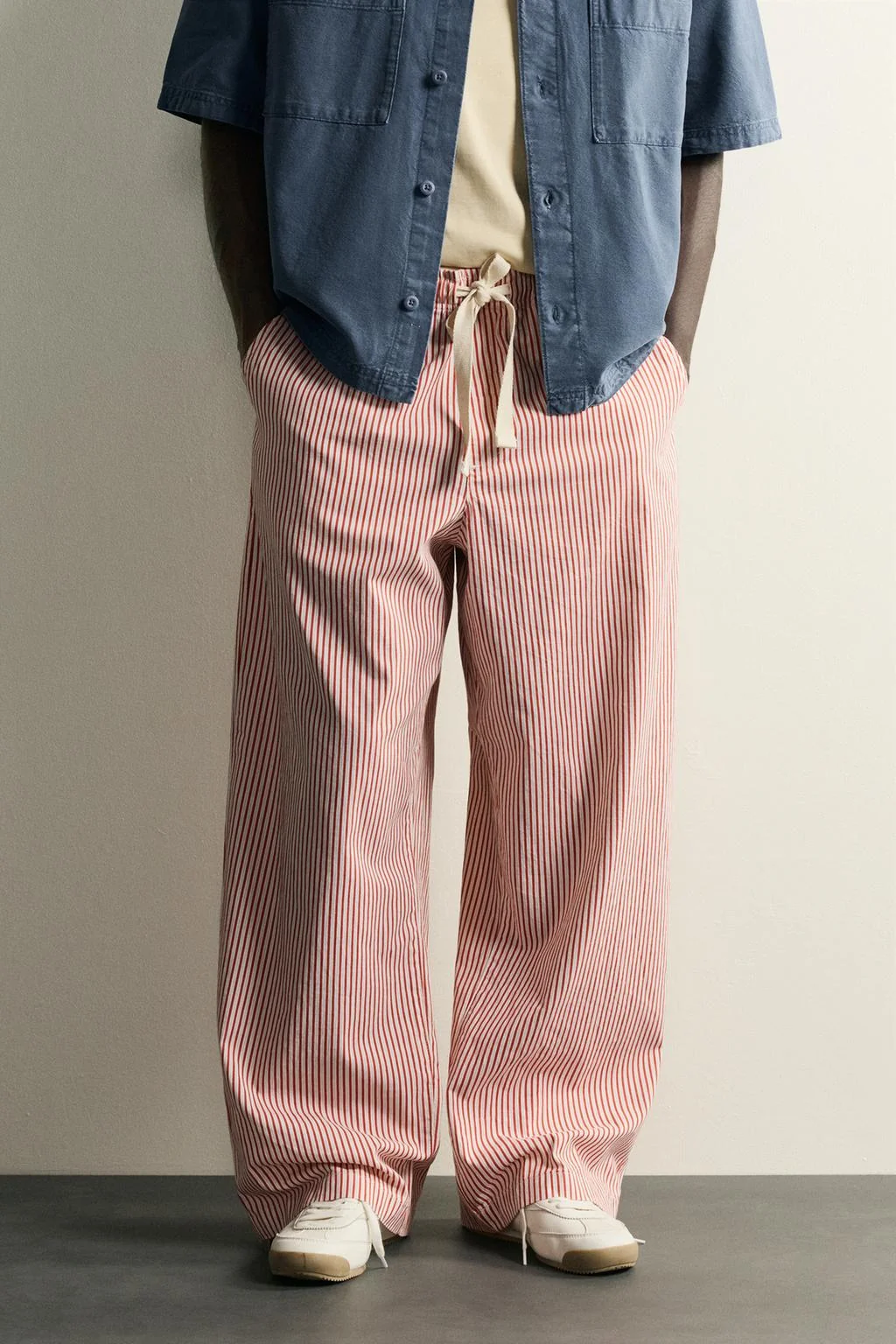 STRIPED BAGGY FIT TROUSERS