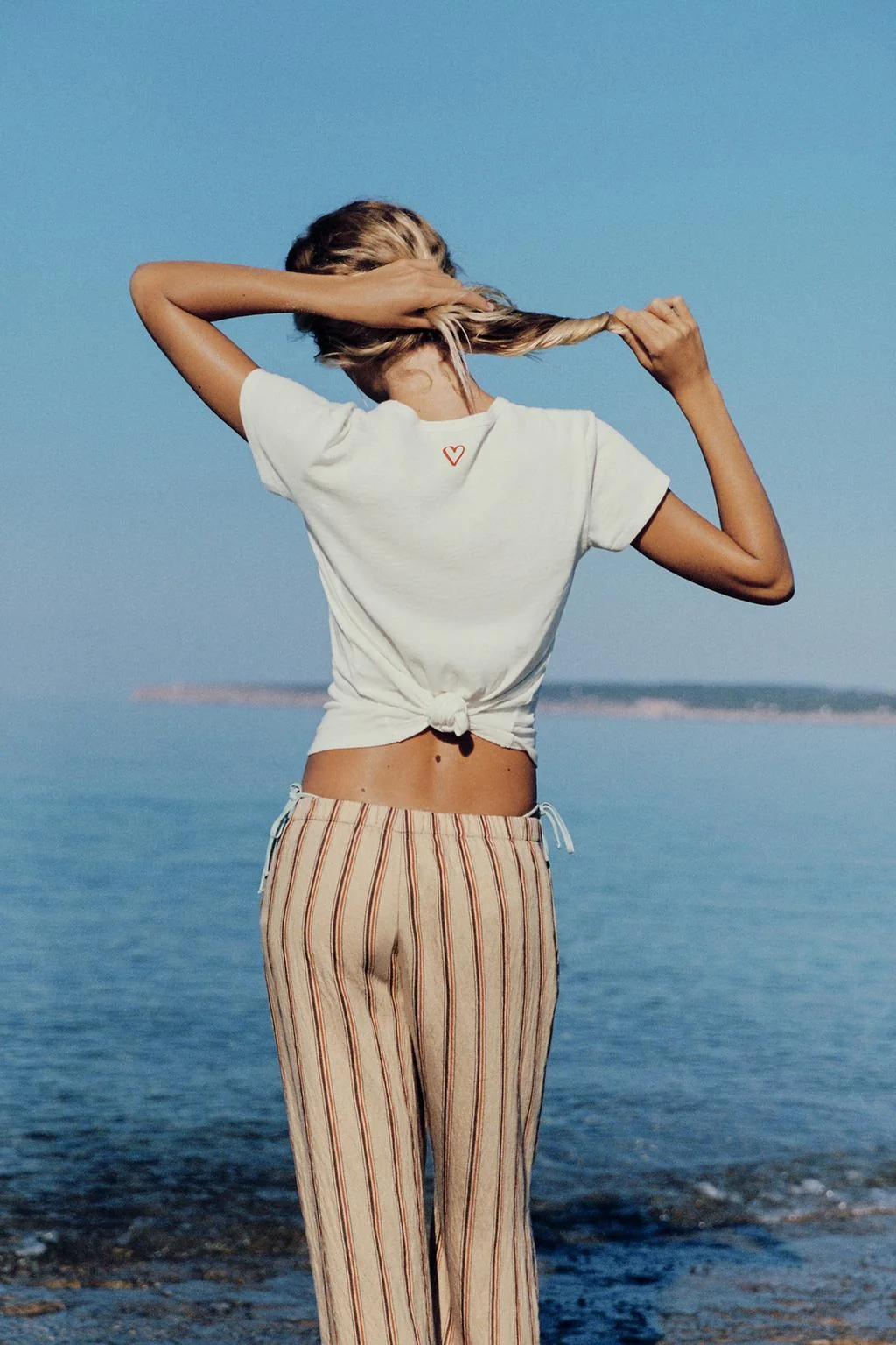 STRIPED FLOWING TROUSERS