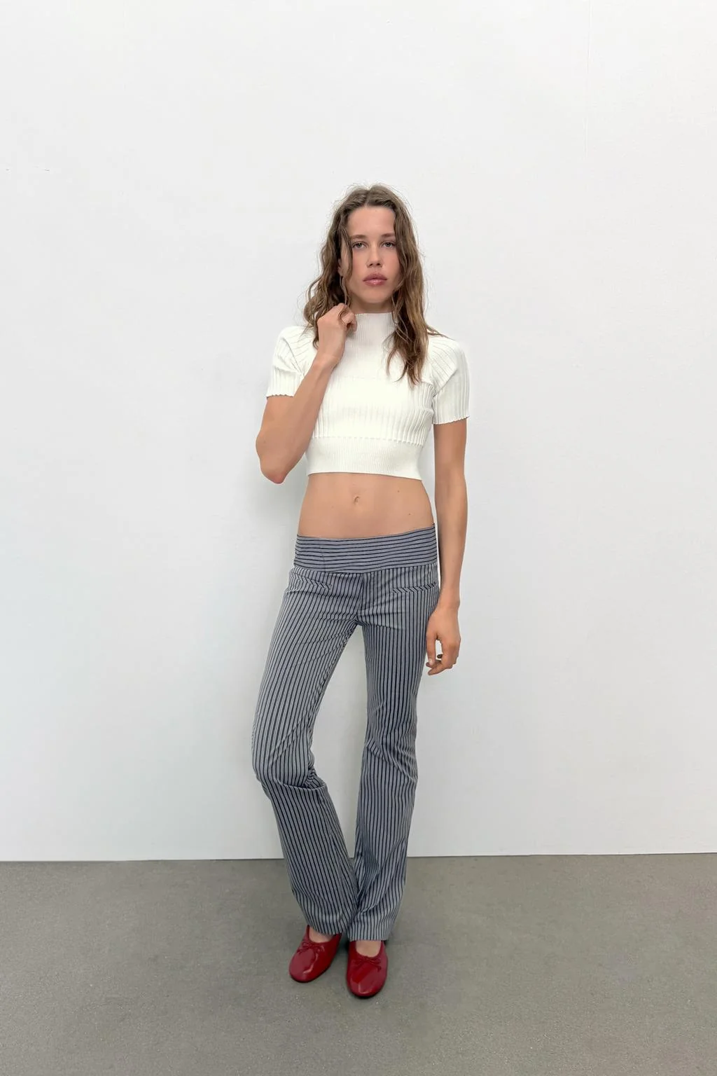 Расклешённые брюки в полоску