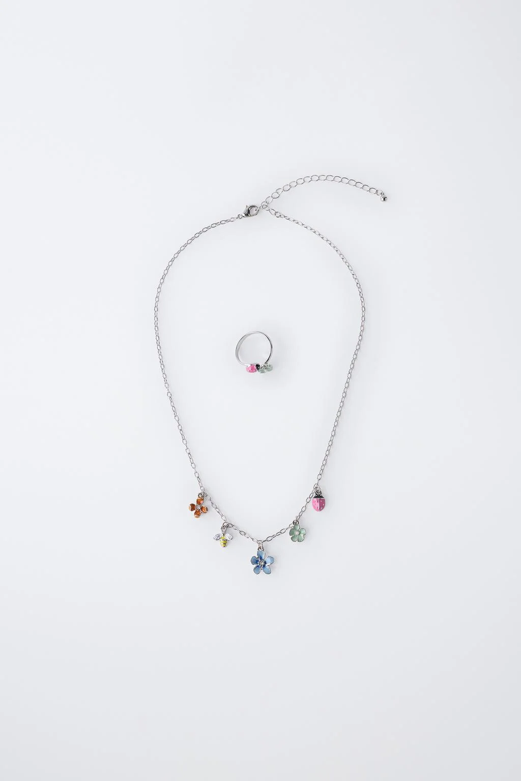 Набор из ожерелья и кольца фигурной формы — Брюски