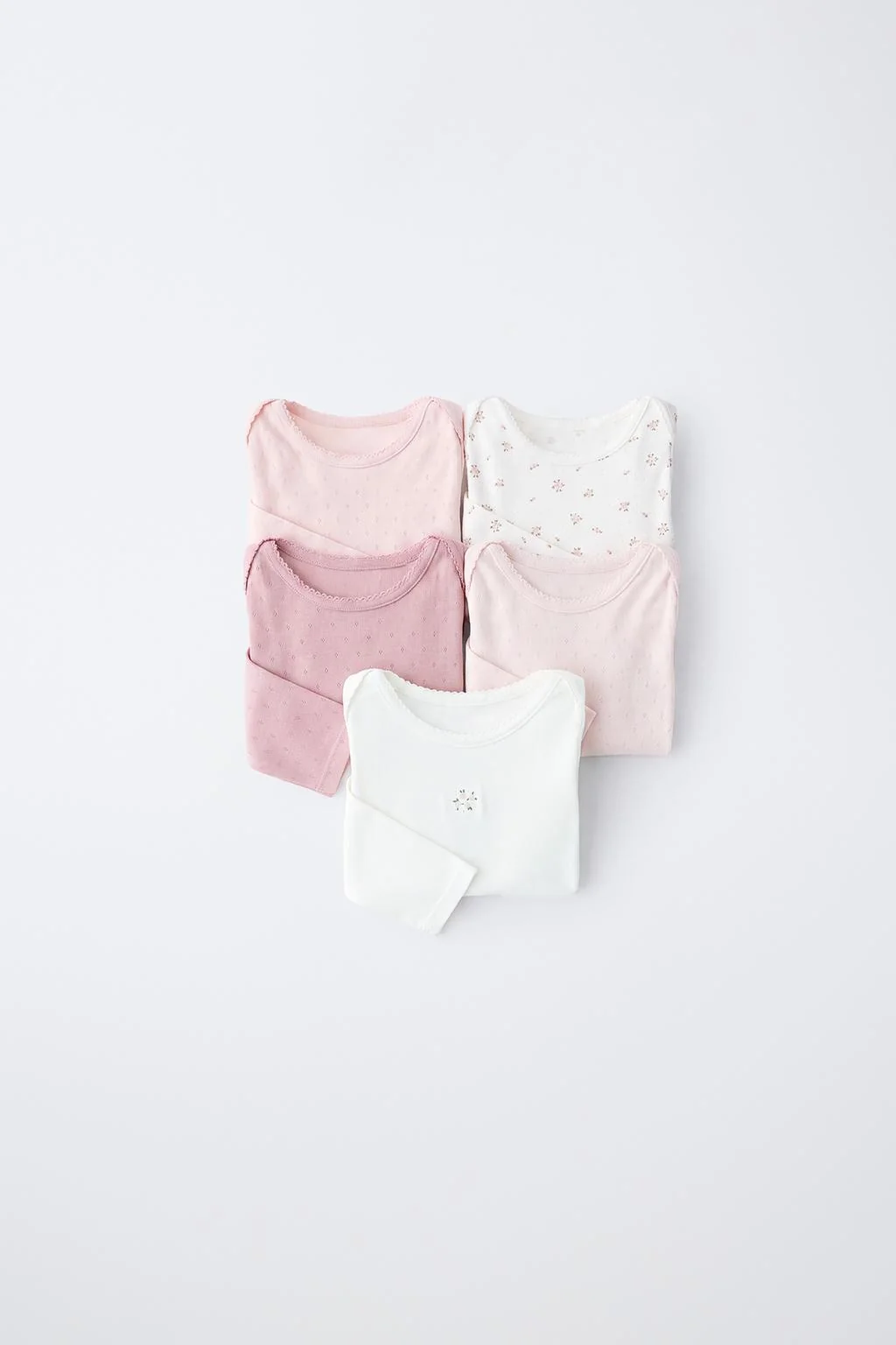 5-PACK OF FLORAL BODYSUITS