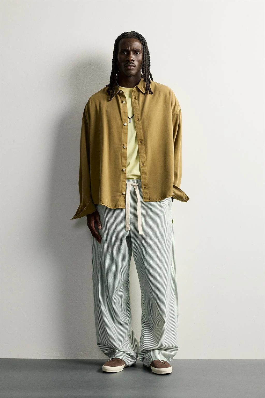 STRIPED BAGGY FIT TROUSERS