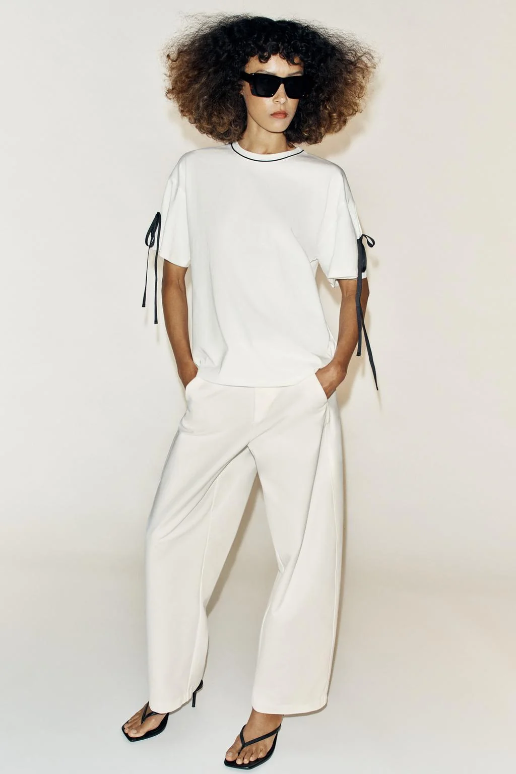 T-SHIRT WITH CONTRAST PIPING AND TIES