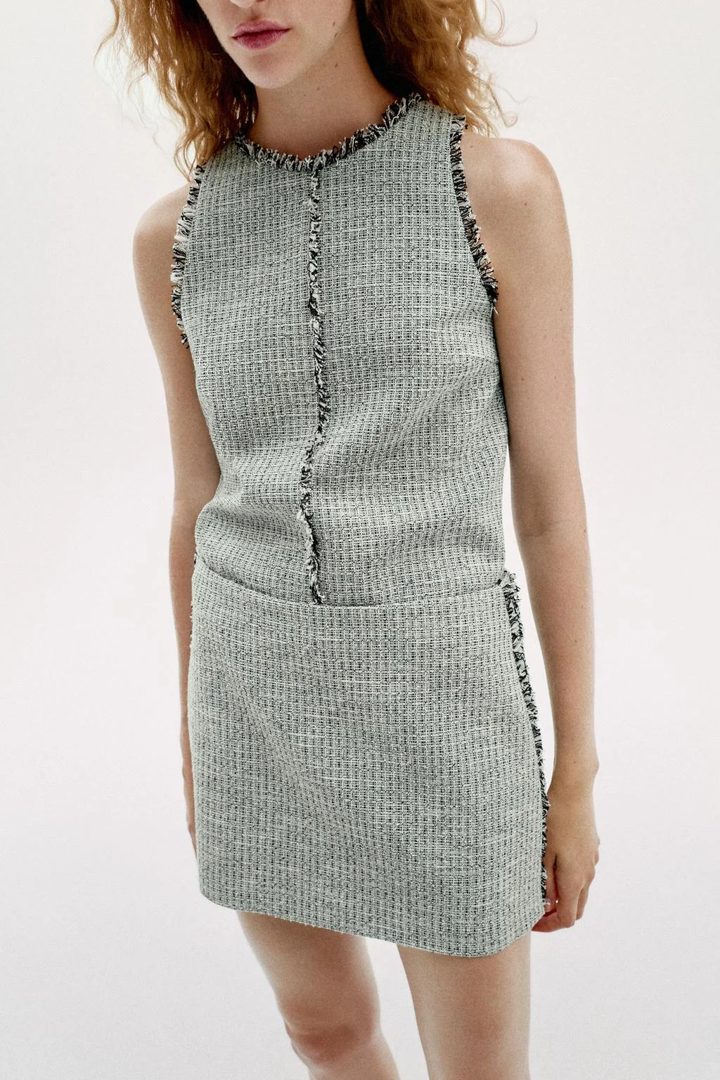 TEXTURED FRAYED MINI SKIRT